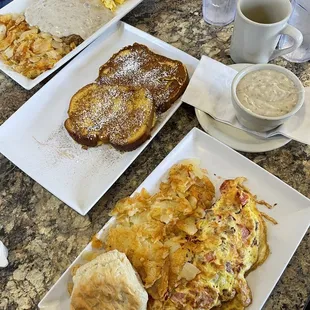 Chicken fried steak California omelette with a biscuit and a side of gravy! Side of French toast  Hot coffee
