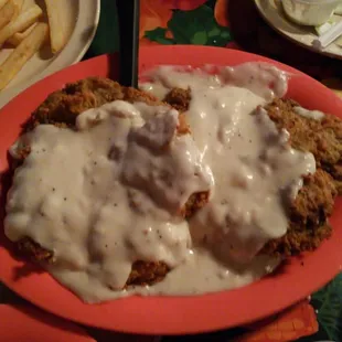 Large chicken fried steak. Enough for two.