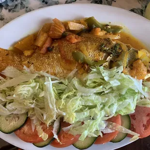 Steam snapper with salad. I&apos;ve ordered this three times this month cause it&apos;s so darn good! This is my go to Jamaican restaurant.