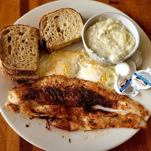 August 2022: 2 Eggs w/ Blackened Fish &amp; Grits ($14.99) Very good breakfast after adding salt to the grits
