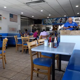diners sitting at tables in a restaurant