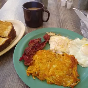 Bacon and eggs, hash browns, and eggs.