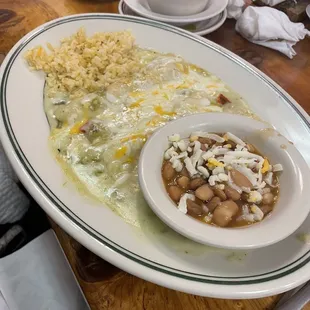Creamy green enchiladas plate