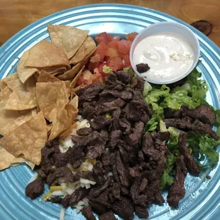 Steak Taco Salad + Tea= $20 Not happy to say but, even Taco Bell has a better tasting taco salad.