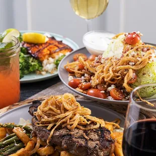 Mama's got the whole dinner lined up! Hand-cut, perfectly cooked New York Steak, Wedge Salad and Grilled Salmon.