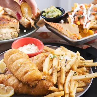 Mama's Fish &amp; Chips with tempura-battered fresh fish, Mama's garlic fries, tartar sauce