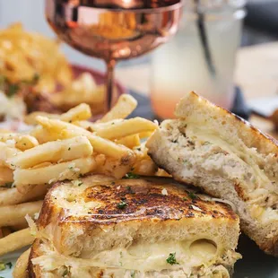 Mama Maria's Tuna Melt  with fresh, Albacore tuna salad on thick, toasted sourdough with melted mozzarella &amp;
Swiss cheese.