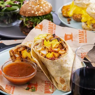 Mama's Hash-a-Burrito!
Scrambled eggs, choice of meat, Mama's potatoes, grilled onions, cheddar and mozzarella, huge flour tortilla