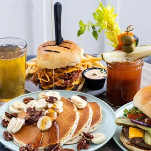 Jack's Colossal Pancake Stack with sliced bananas &amp; candied pecans at Mama's Comfort Food &amp; Cocktails