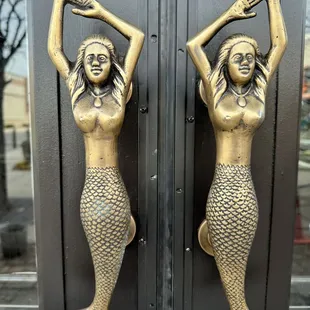 two mermaid doors