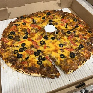 Taco pizza after we picked it up they said sorry were out of lettuce.