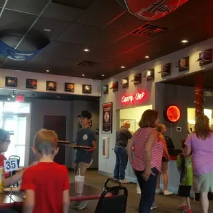 Take out counter area adjacent to front counter where orders are placed.