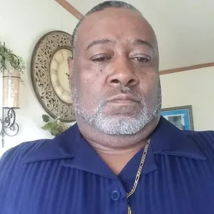 a man in a blue shirt