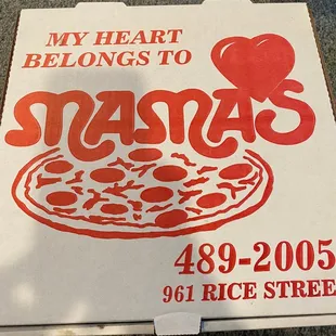 a pizza box on the ground