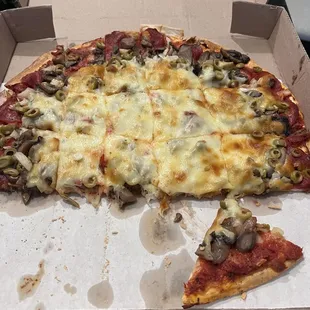 We devoured half the pizza in no time. The sauce is outstanding. Perfect crust. Wood fired.