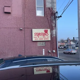 a car parked in front of a building