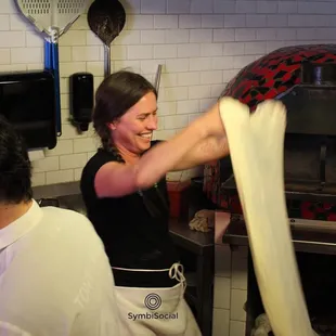 Stretching out the dough