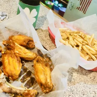 Crispy juicy tender hot wings with awesome shoe string fries!