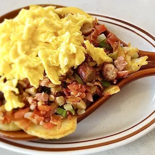 Supreme skillet topped with scrambled eggs