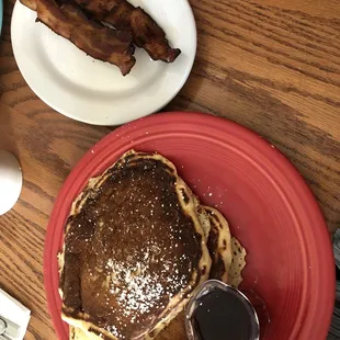 Pancakes with a side of crispy bacon. The pancakes look a little dark in this picture, but they taste absolutely perfect