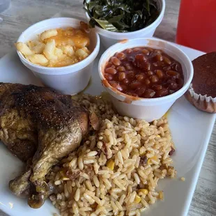 Jerk chicken special with dirty rice, collard greens, baked beans, mac and corn bread.