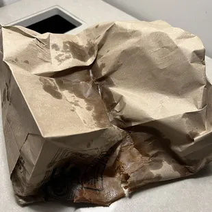 "To-Go" packaging. Aka 2 soggy paper plates and a brown bag.
