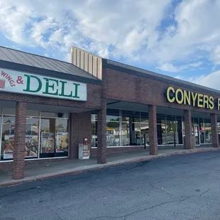 Next to conyers pharmacy, the same plaza with family dollar and dollar tree