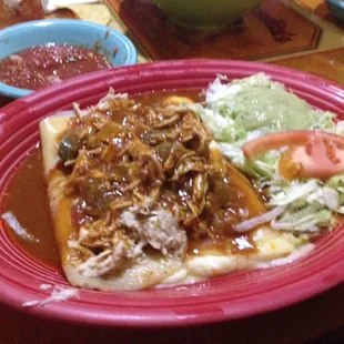 Cheese enchilada with chicken on top... Forgot the name, but it was an entree without a number.