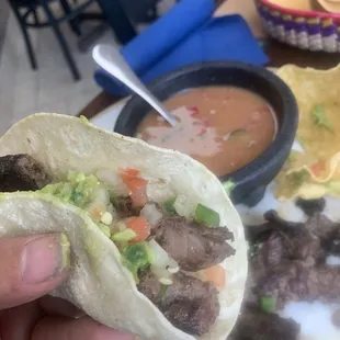 Fajita taco with guacamole and pico de gallo