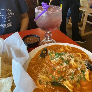 Pescado a lo Macho, pomegranate margarita.