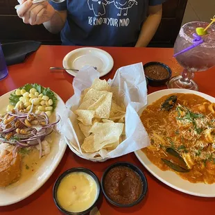 Ceviche de Pescado, Pescado a lo Macho, pomegranate margarita, &amp; typical intro chips/cheese/salsa.