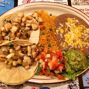 The #58: Tacos de Pescado were so good! Try these with lime! Ps. the guac rocks. (Recommend)