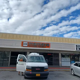 Front entrance in Pearl Kai shopping center facing Kamehameha Hwy.  Very easy to find,  lots of free parking