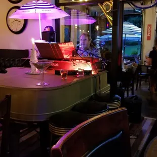 a piano in a restaurant