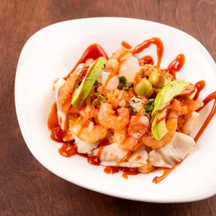 a plate of food on a wooden table