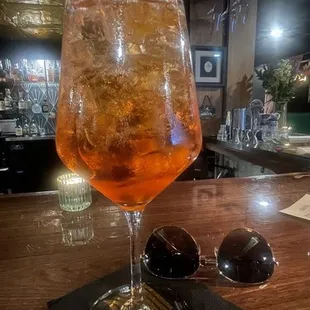 a drink and donuts on a table