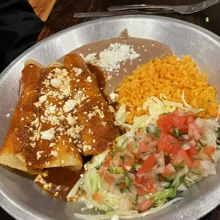 Beef Enchiladas with red sauce $13