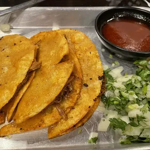 Birria tacos $15