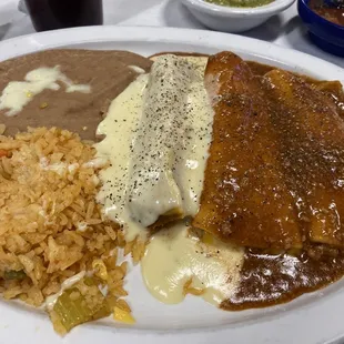 Pick 3  Tamale with cheese sauce Cheese &amp; onion enchilada with chili