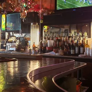 The original bar is intact from the old photo