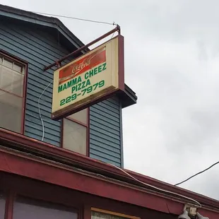 a sign on the side of a building