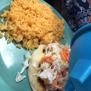 Pupusa mix with bomb rice. So good.