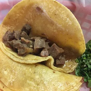 Lingua taco with corn tortilla