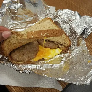 Breakfast sandwich. Multigrain bread, eggs, turkey sausage &amp; cheddar cheese.