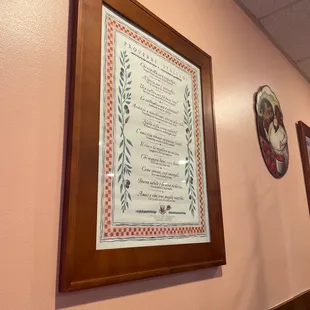 a wall with a plaque and a plaque on it