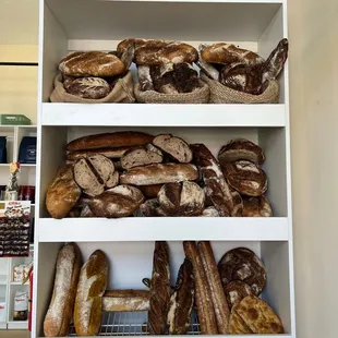 shelves of bread and bread rolls