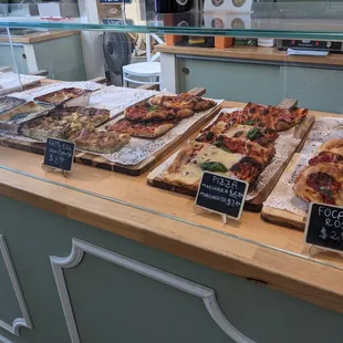 Display case with savory items.