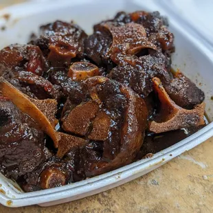 a close up of a dish of meat