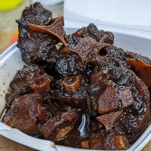 a dish of meat with sauce