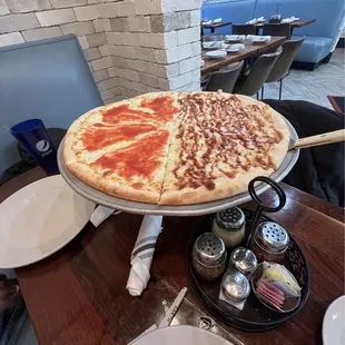 Half cheese bread with tomato sauce on top and half barbecue chicken